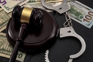 Gavel, Handcuffs and Money